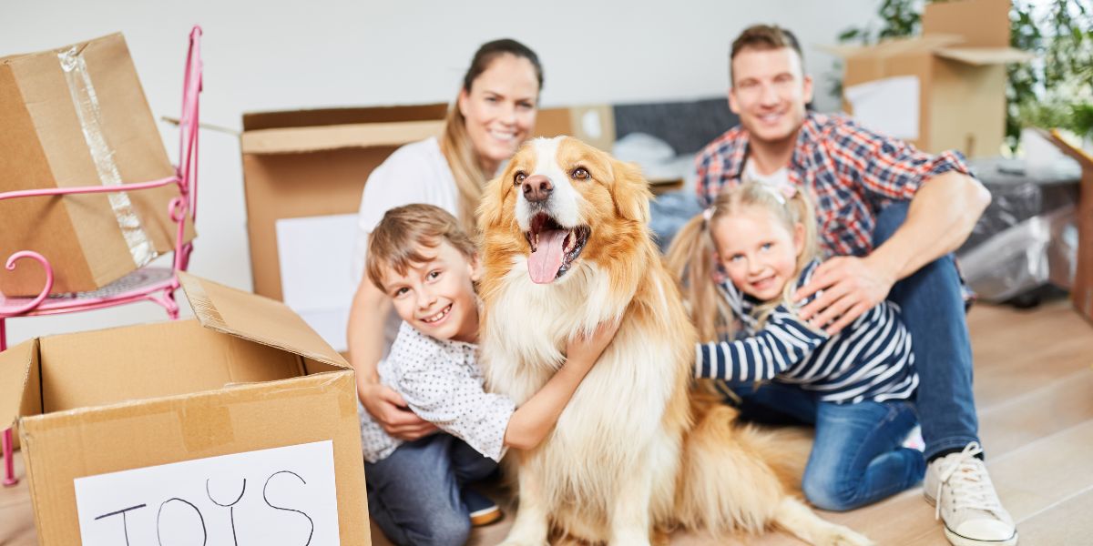 family moving with a dog
